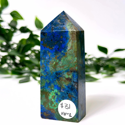 azurite and malachite crystal tower on a white leafy background