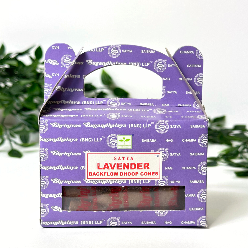 Box of Satya Lavender Backflow Incense Cones on a white background with green leaves.