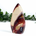 Mookaite stone teardrop with a label on a white background