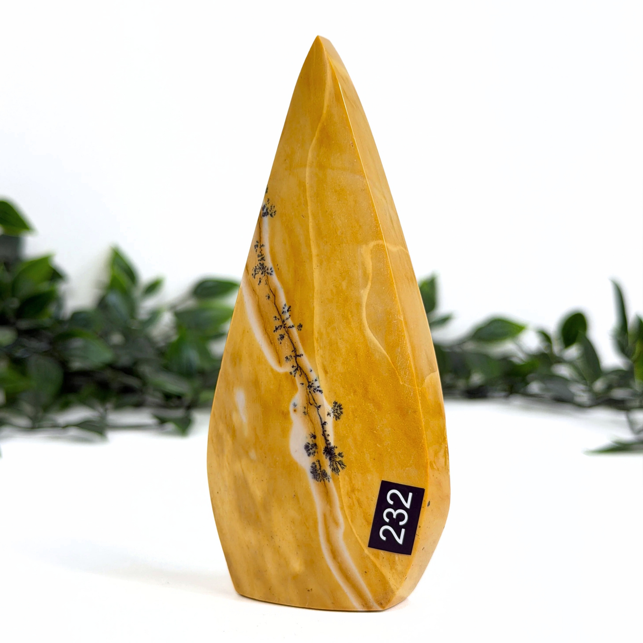 Mookaite teardrop with black patterns and the number 232 on a white background